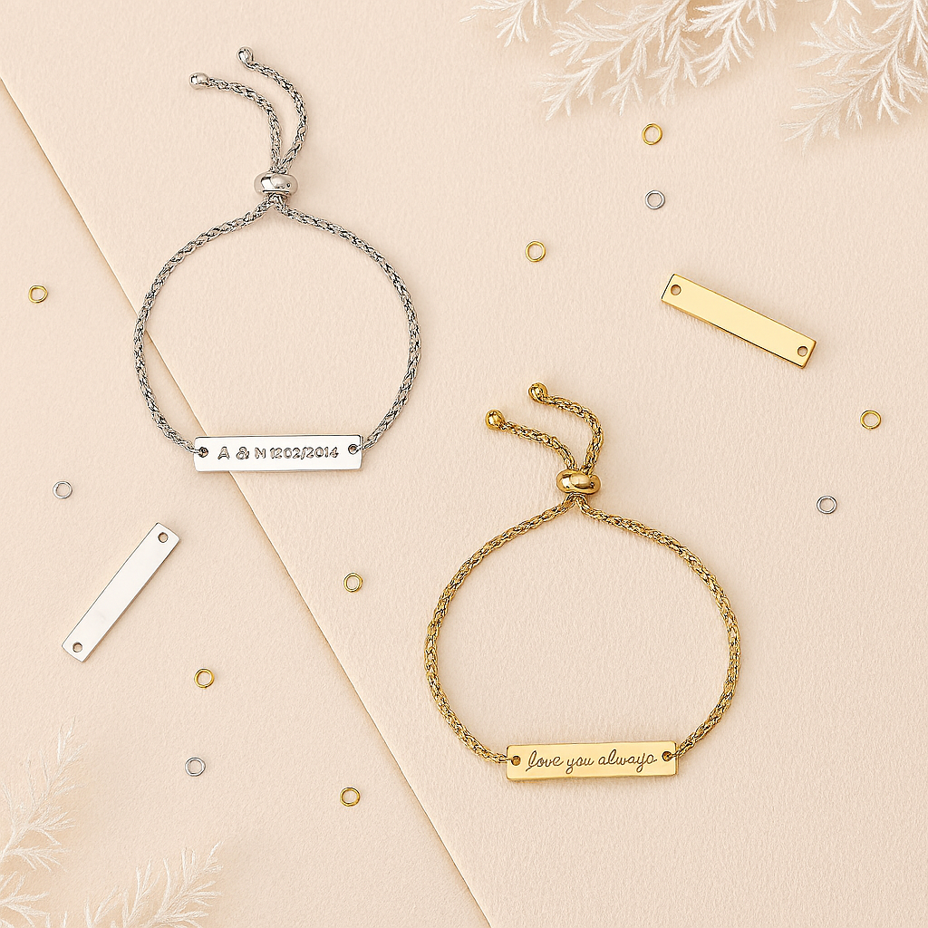 Two personalized adjustable bar bracelets—one gold and one silver—styled on a cream and beige background with frosted foliage. Engraved with “Love you always” and “A & N 15/02/2024,” ideal for gifting and keepsakes.