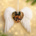 Elegant white feather angel wing ornament with a heart-shaped centre personalised with a photo and text, hanging on a soft champagne gold Christmas background.