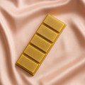 Elegant 5-cell gold glitter wax melt snapbar on blush pink satin background – luxury soy wax fragrance bar for home scenting, handmade and vegan-friendly, perfect for gifting or aromatherapy