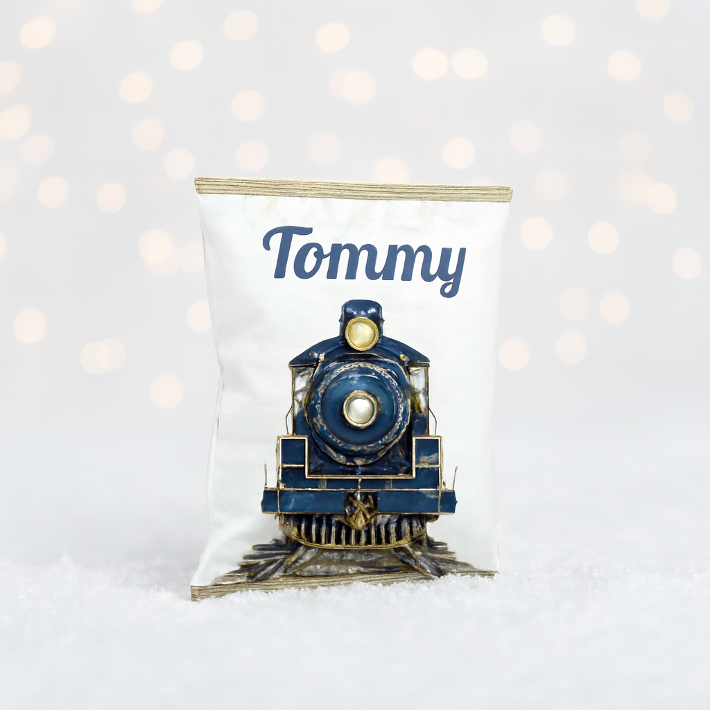 Luxury personalised blue Christmas treat bag with vintage train illustration and name ‘Tommy’ in festive font