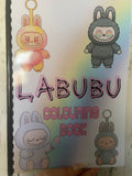 Labubu Colouring Book with pastel rainbow background and four cute bunny-monster characters on the front cover, featuring comb binding and colourful illustrated designs
